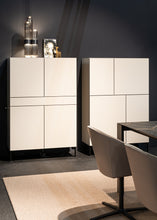 Laden Sie das Bild in den Galerie-Viewer, Kettnaker Highboard Case mit vier Türen in Weiß, modernes Designmöbel mit schwarzen Füßen
