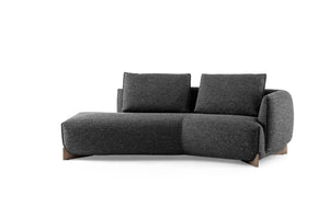 Leolux Naila Divan in Stoff Charcoal von vorne mit Hocker links