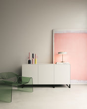 Laden Sie das Bild in den Galerie-Viewer, Sideboard 2020500 in Weiß mit optionalem Kufengestell – modern kombiniert mit rosa Kunst und Designstuhl
