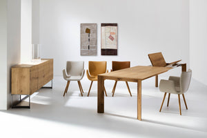 SR-1 light – Der Esstisch, der sich anpasst
Der SR-1 light von Scholtissek ist mehr als nur ein Esstisch – er ist ein flexibler, funktionaler Mittelpunkt für Ihr Zuhause. Mit seinem klaren Design, den natürlichen Materialien und einer ausgeklügelten Technik passt er sich mühelos an Ihre Bedürfnisse an. Ganz gleich, ob für ein gemütliches Abendessen zu zweit oder ein geselliges Mahl im größeren Kreis – der SR-1 light ist immer die perfekte Wahl.

Flexibilität in seiner besten Form
Der SR-1 light verfügt über